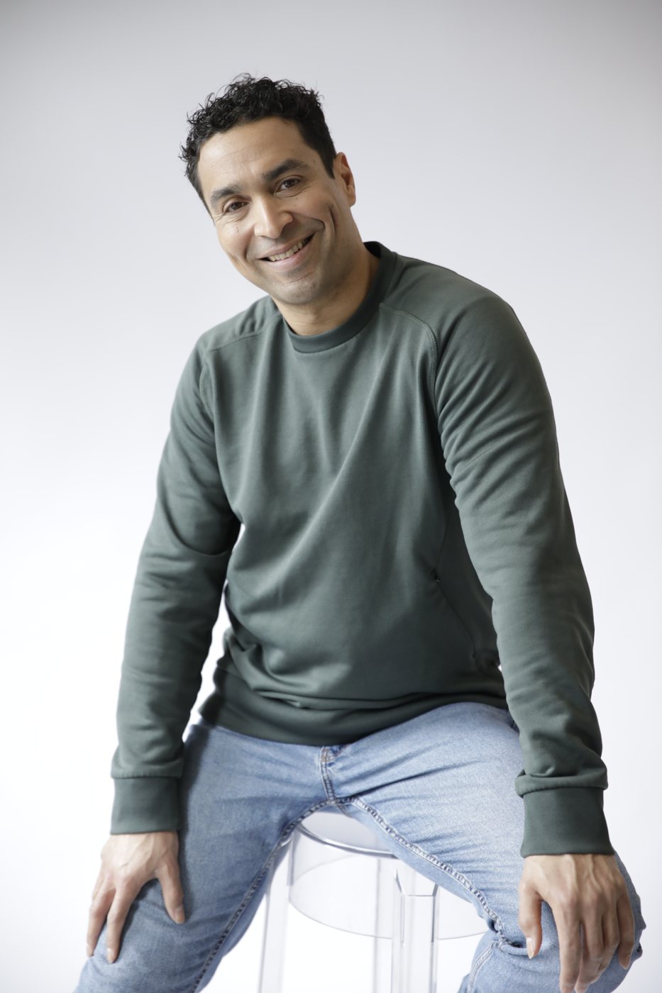 Shorombo Mooij seated, smiling